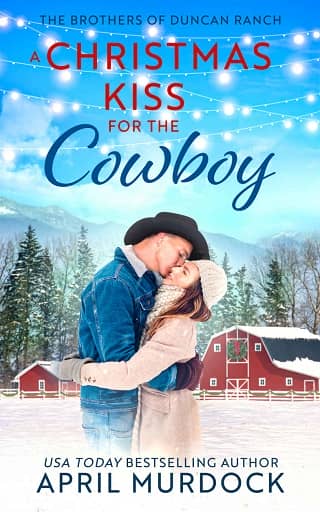 A Christmas Kiss for the Cowboy by April Murdock