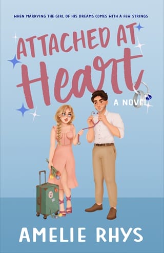 Attached At Heart by Amelie Rhys