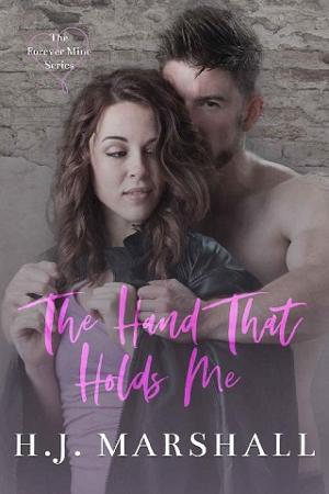 The Hand That Holds Me by H.J. Marshall